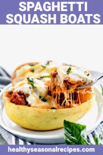 side view of cheesy stuffed spaghetti squash with cheese pull