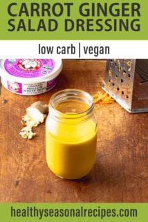 side view of carrot ginger dressing mason jar
