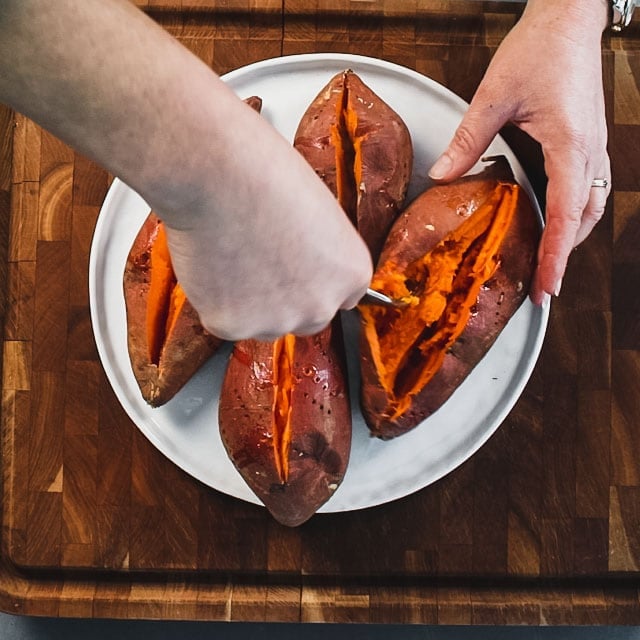 use a fork to fluff up the insides of the sweet potatoes