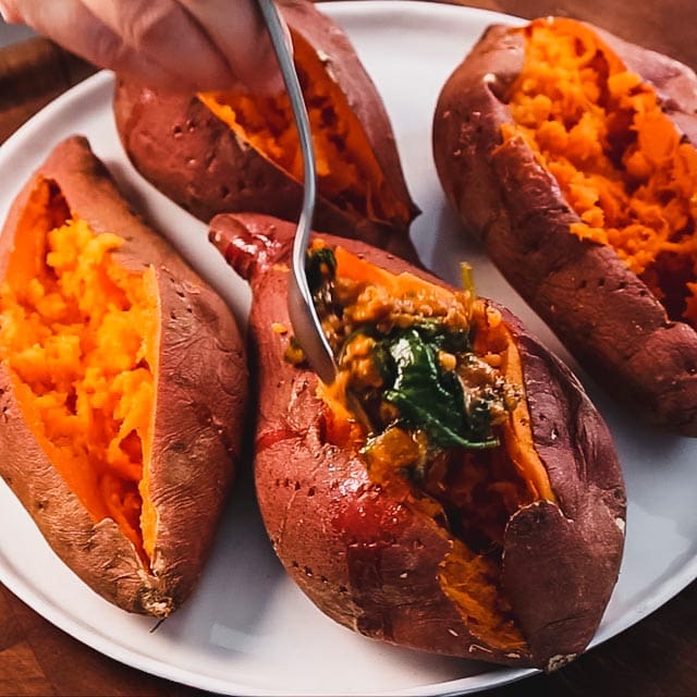 add the filling to the sweet potatoes