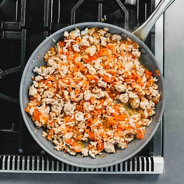 the cooked ground chicken with the veggies after they have been softening for about 5 minutes