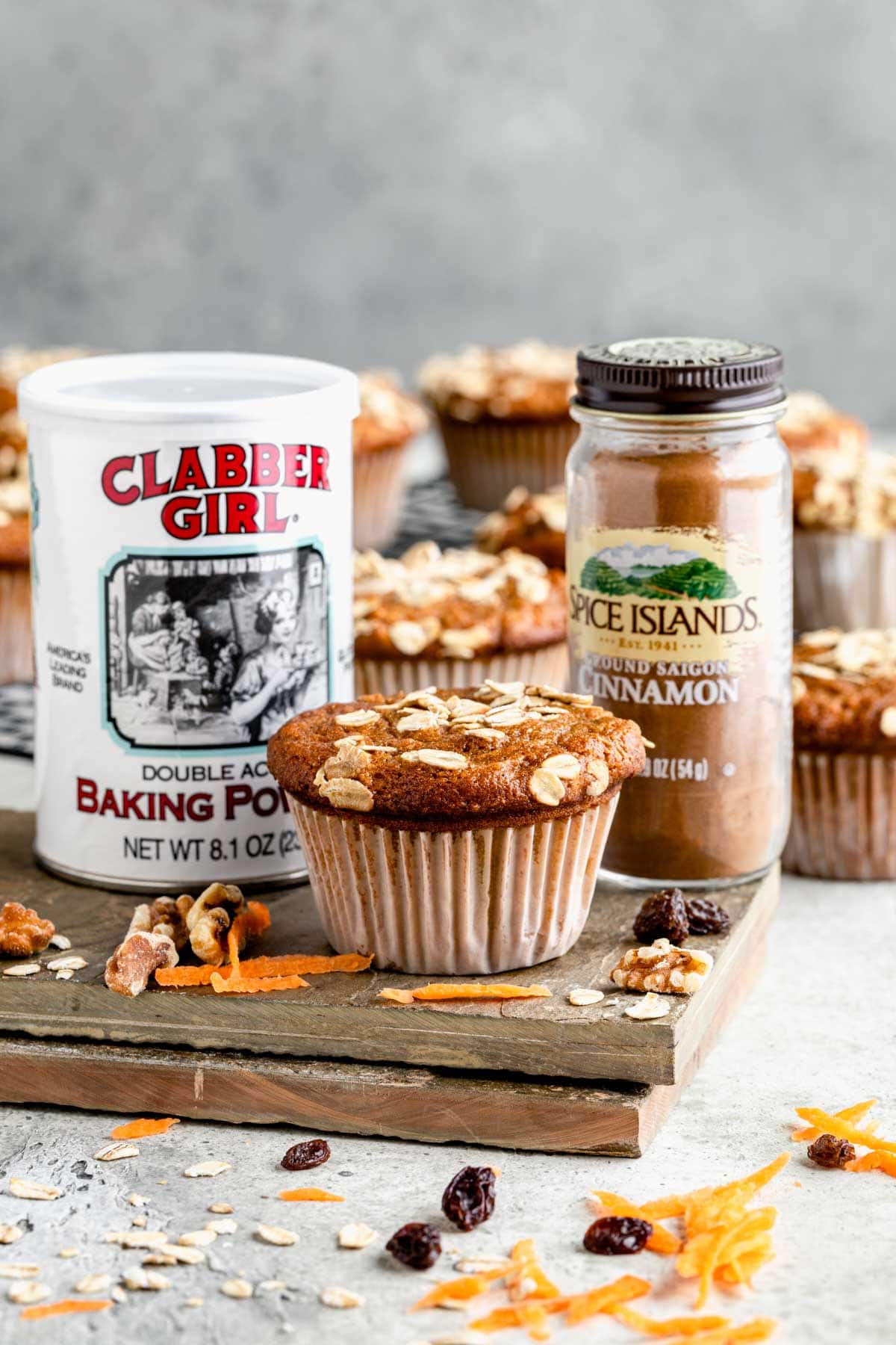 baking powder, cinnamon and a muffin from the side