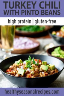 side angle black bowl turkey chili with avocado
