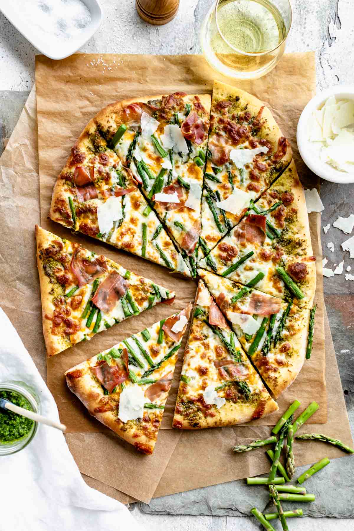 Overhead of the whole pizza cut into wedges