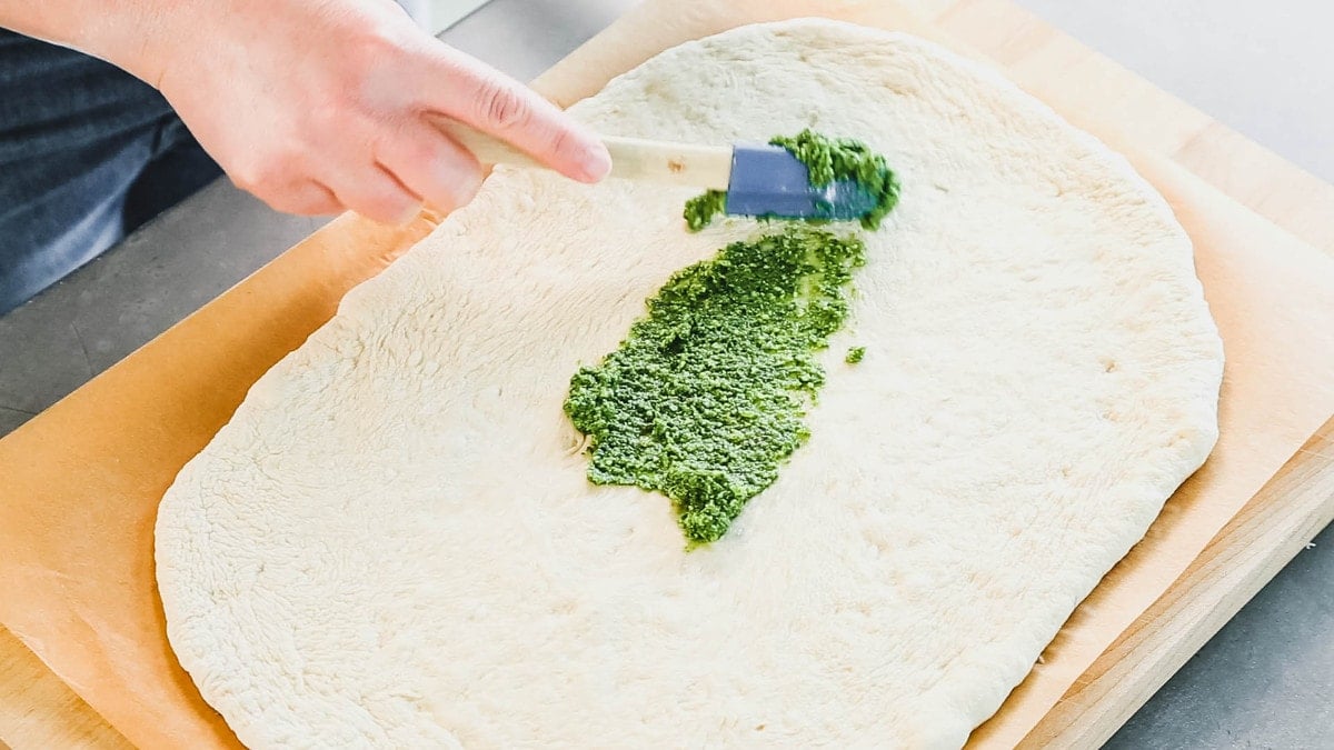 spreading the pesto