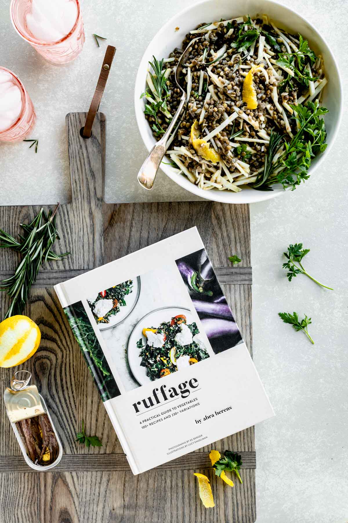 ruffage cookbook in the kitchen with a bowl of salad