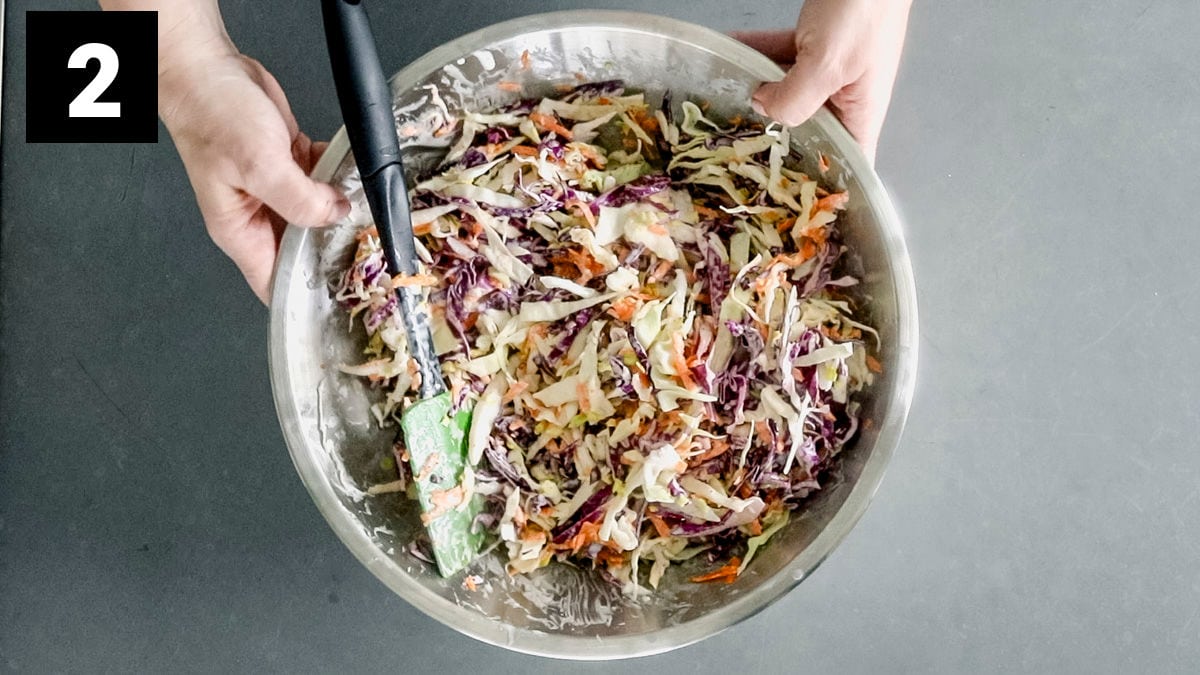 the coleslaw after it is mixed into the dressing