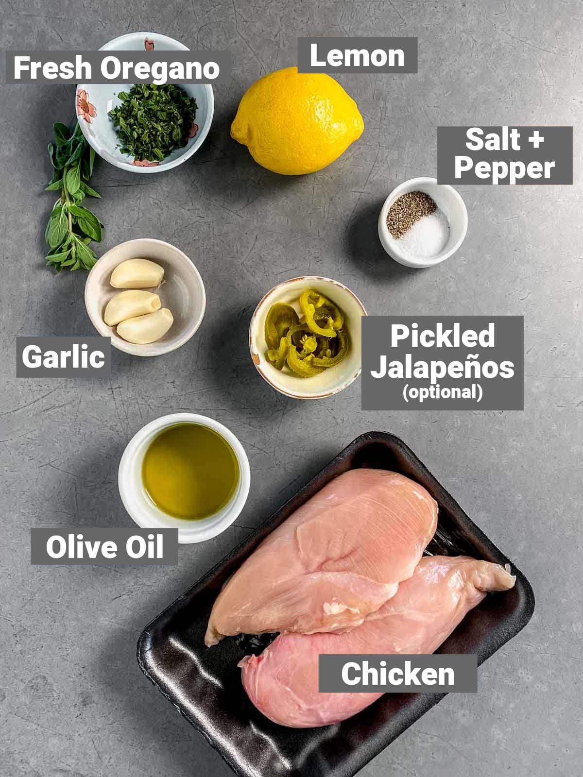 A close up of food on a table, with Chicken and Lemon