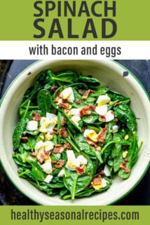 spinach salad with bacon and eggs text overlay