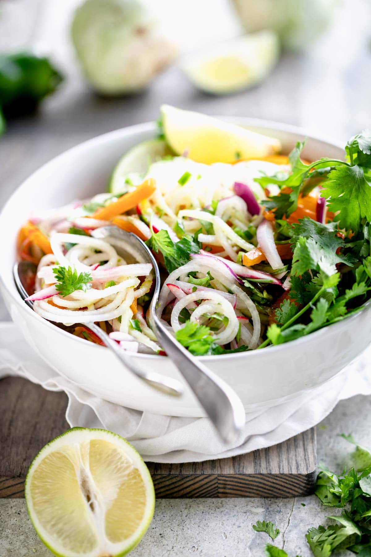 side view of slaw with a spoon