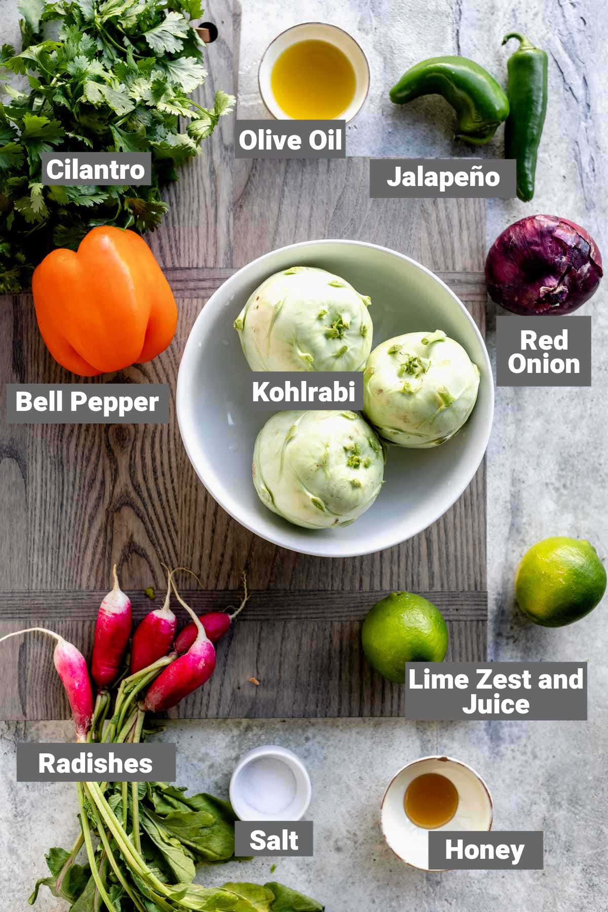 ingredients for kohlrabi slaw with text overlay