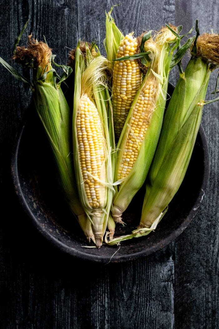 Grilled Corn on dark background