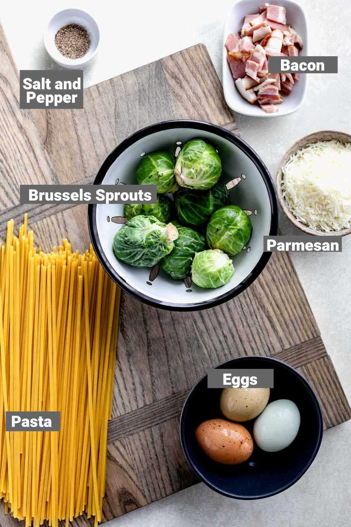 brussels sprouts, linguini and other ingredients for this recipe with text overlay