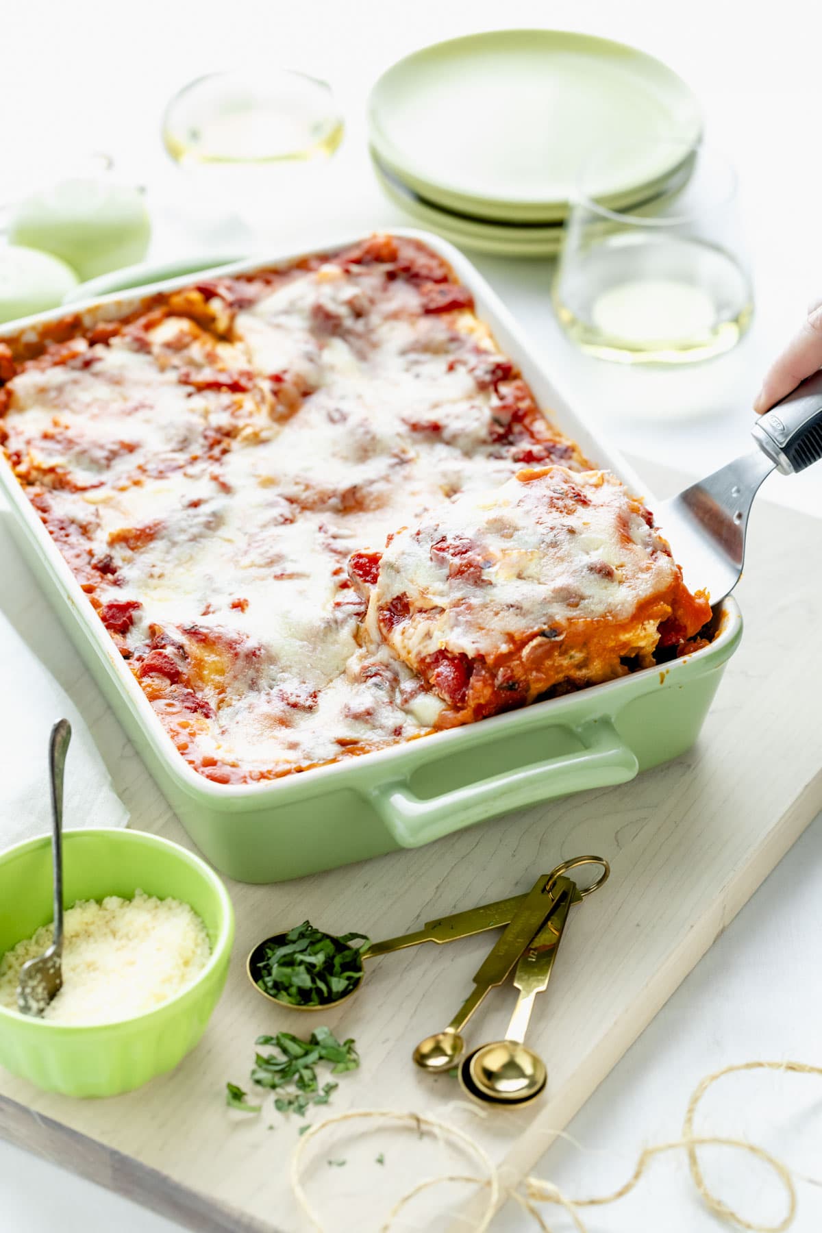 the squash lasagna with a slice being lifted out