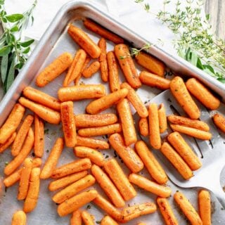 closeup of the sheet pan with the roasted carrots on it