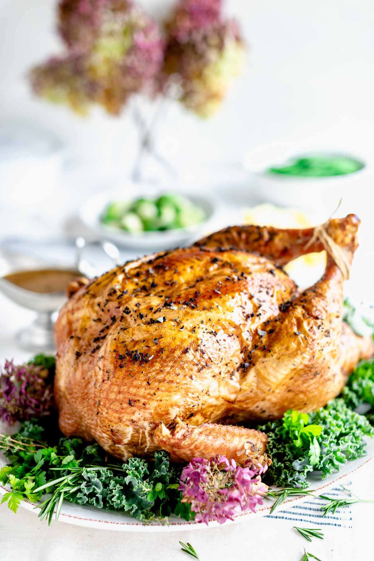 the roasted turkey on a platter from the side