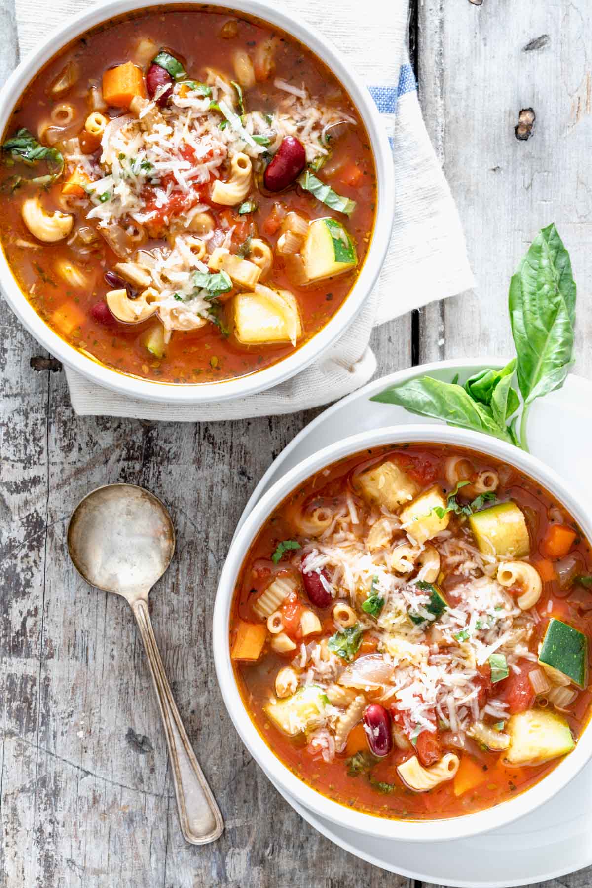 two bowls of minestrone soup overhead