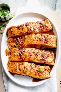 maple glazed salmon on circular white serving platter