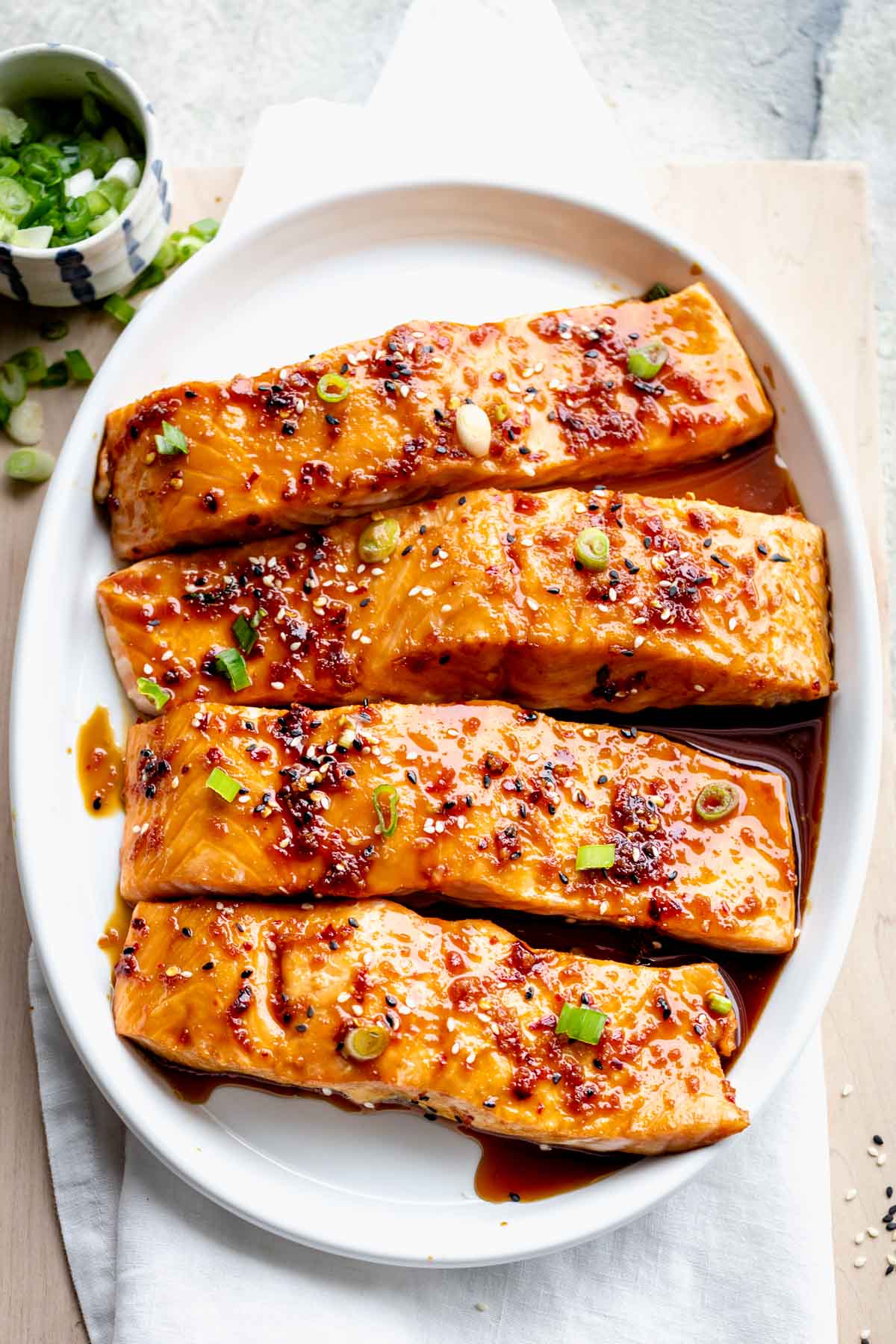 maple glazed salmon on circular white serving platter