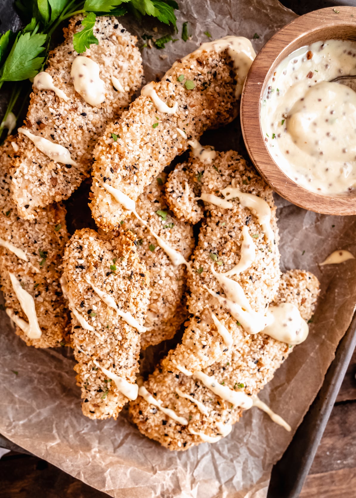 Air Fryer chicken cutlets with aioli on brown parchment