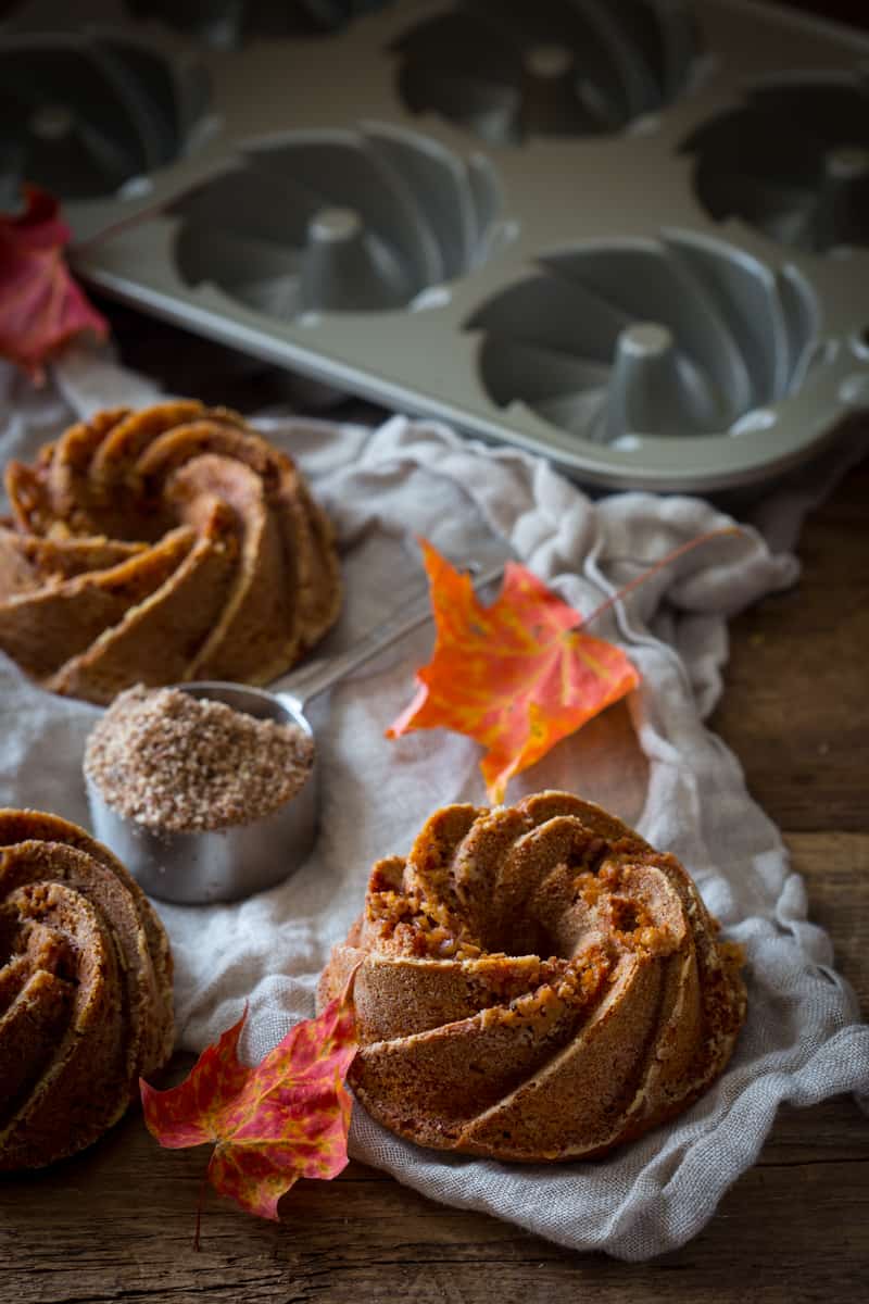 Gluten-free sweet potato mini bundt cakes on a kitchen towel