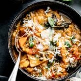 Close up of tuscan ribollita in bowl with spoon