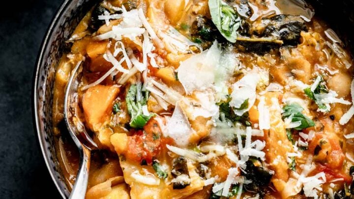 Close up of tuscan ribollita in bowl with spoon