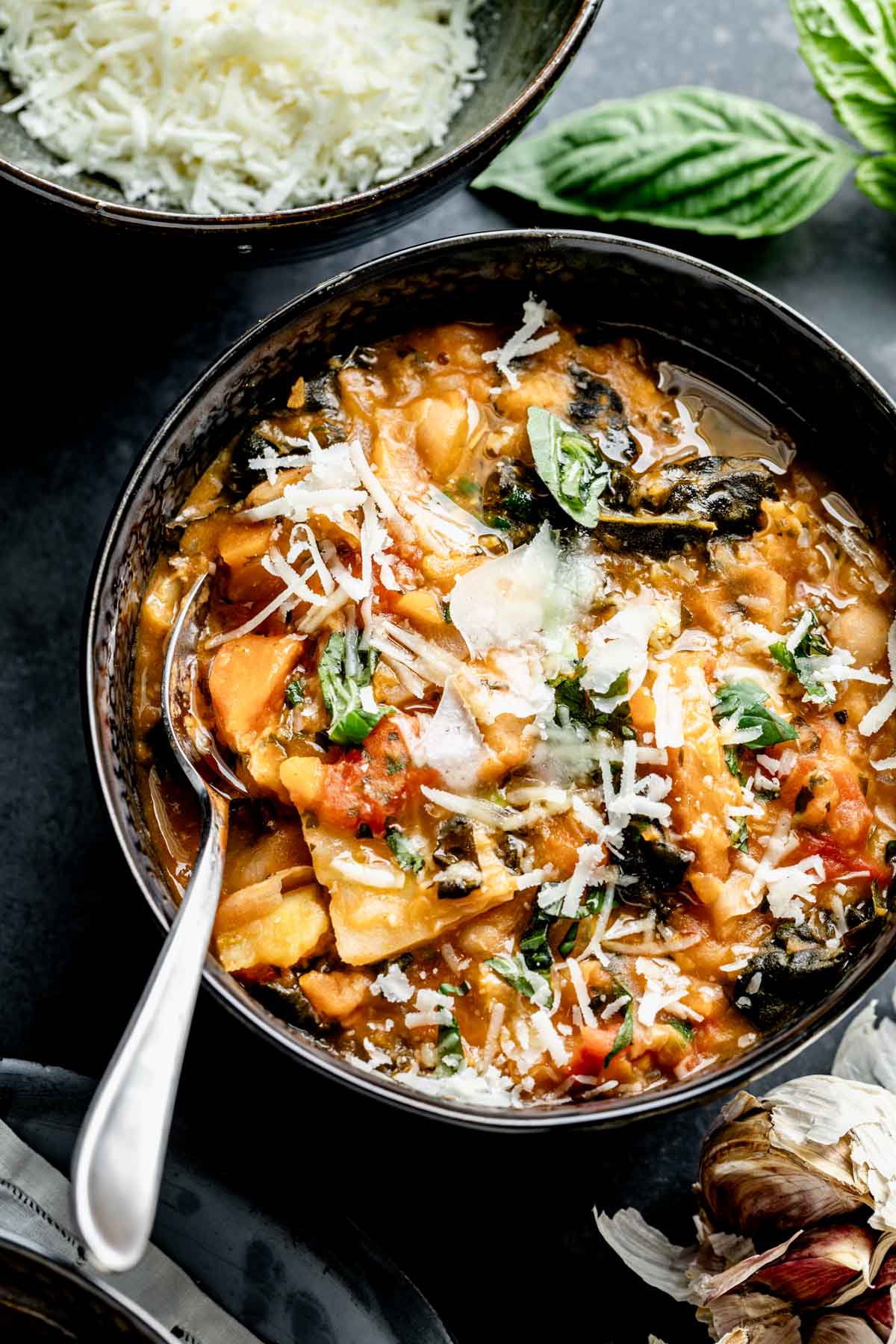 Close up of tuscan ribollita in bowl with spoon