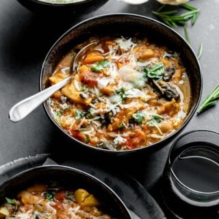 overhead high angle view of a bowl of ribollita with a spoon in it