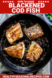 blackened cod fish cooking in a cast iron skillet