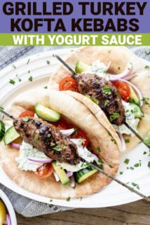 Grilled ground turkey kofta kebabs in a pita pocket with tzatziki sauce on top and text overlay