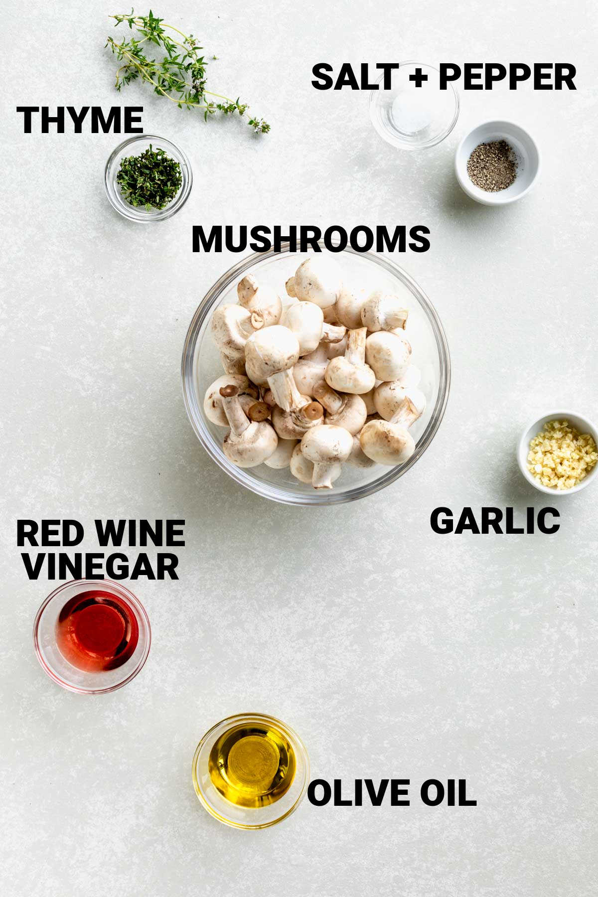 mushrooms, thyme, garlic, red wine vinegar, and olive oil to make mushroom kebabs