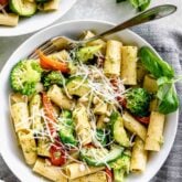 rigatoni pasta smothered in basil pesto and combined with zucchini, broccoli, and bell pepper