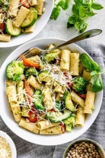 rigatoni pasta smothered in basil pesto and combined with zucchini, broccoli, and bell pepper
