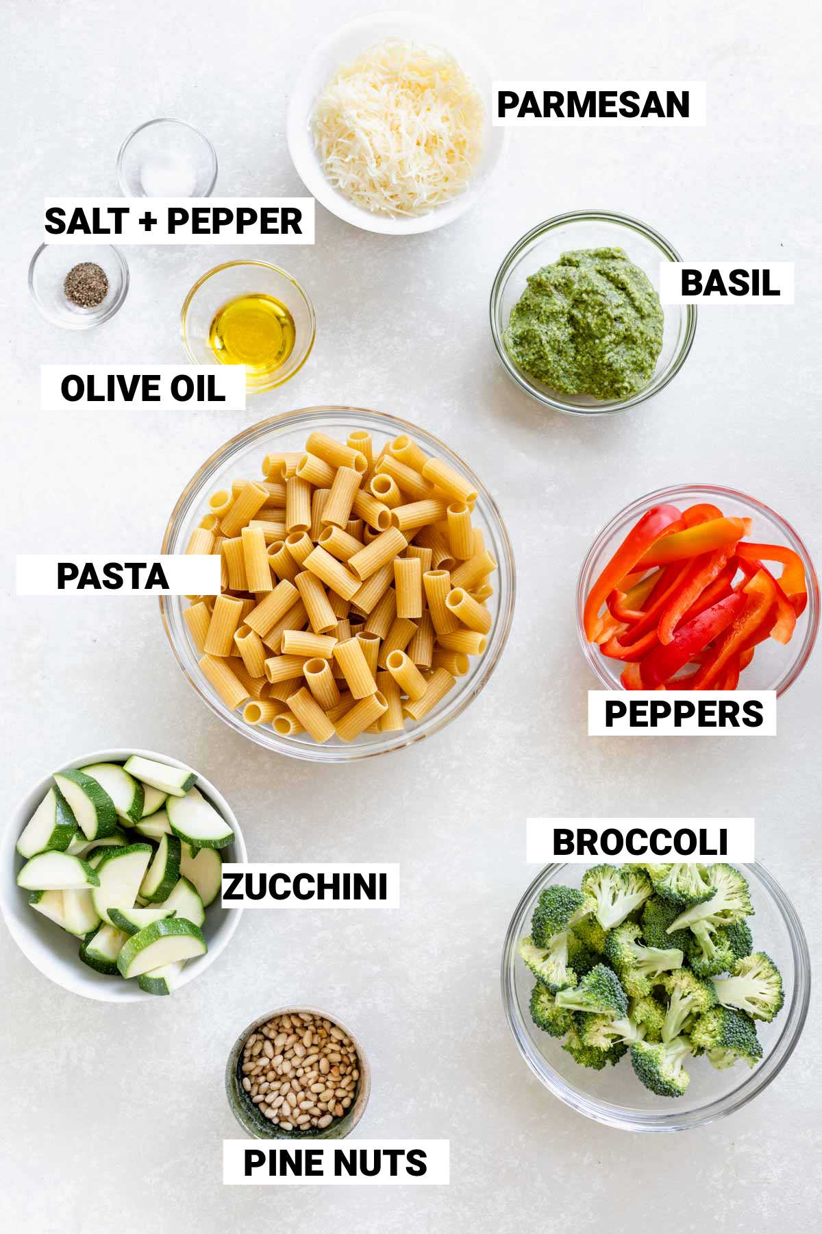 rigatoni, broccoli, pine nuts, zucchini, peppers, basil, parmesan and seasonings