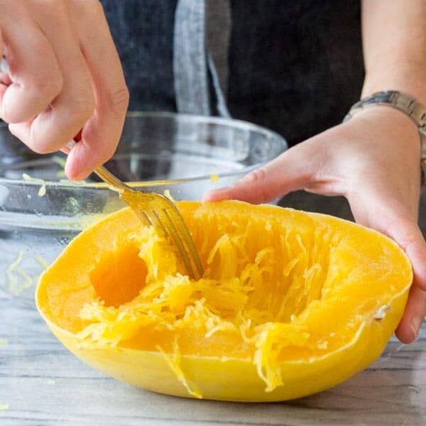digging out the strands of the spaghetti squash