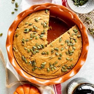 pumpkin-cornbread in an orange pie plate