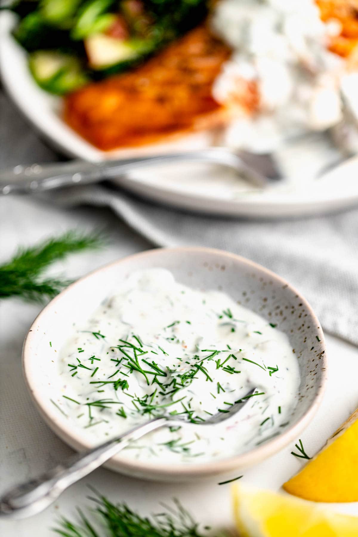 creamy dill sauce in a white bowl