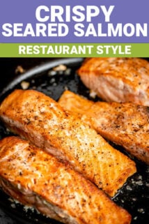 seared salmon in a black pan