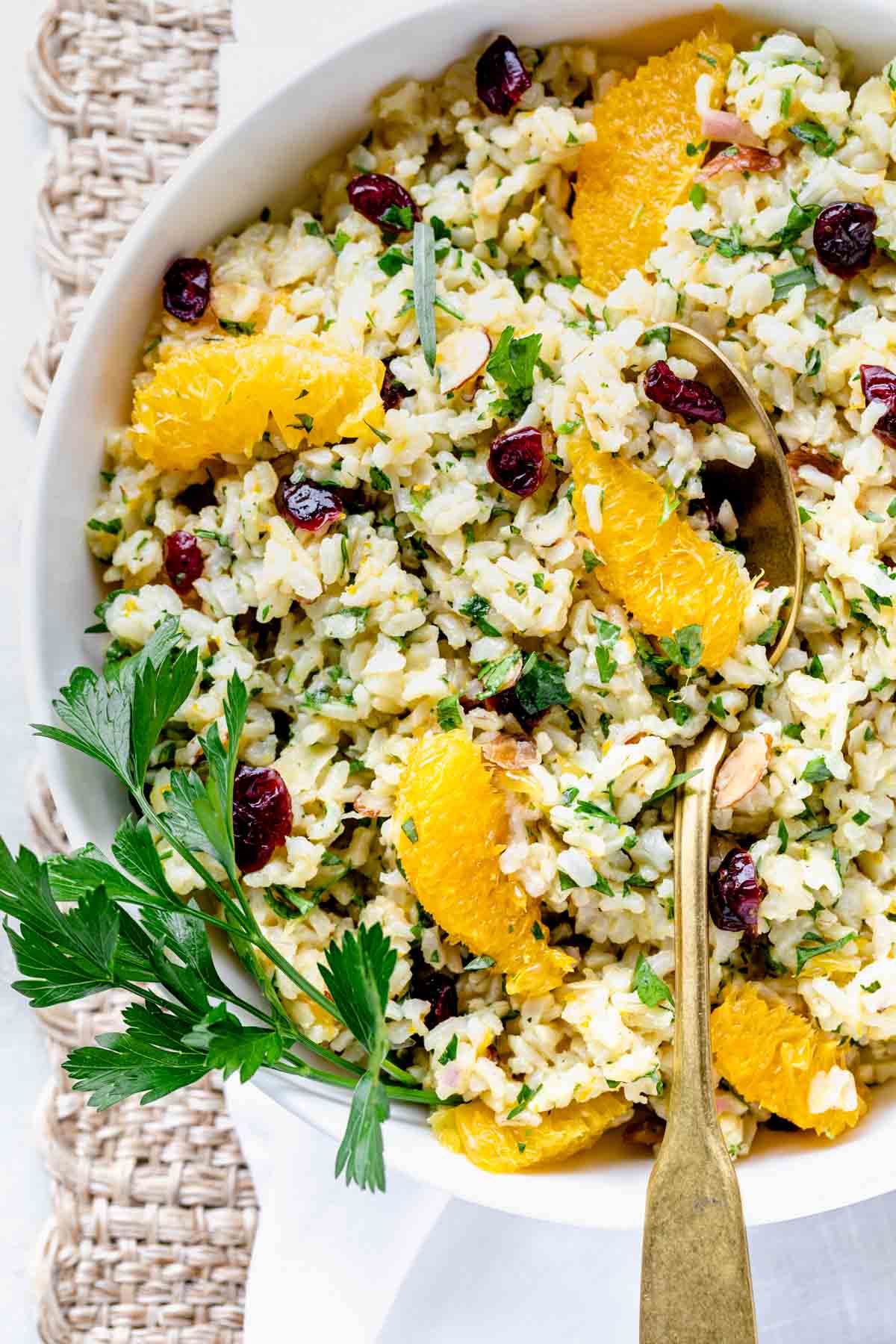 brown rice salad with cranberries, oranges, and nuts