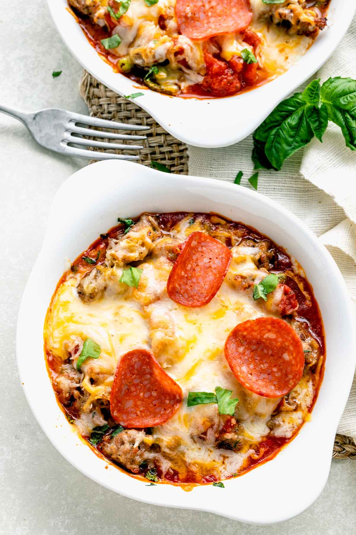 the baked pizza bowls on a white table