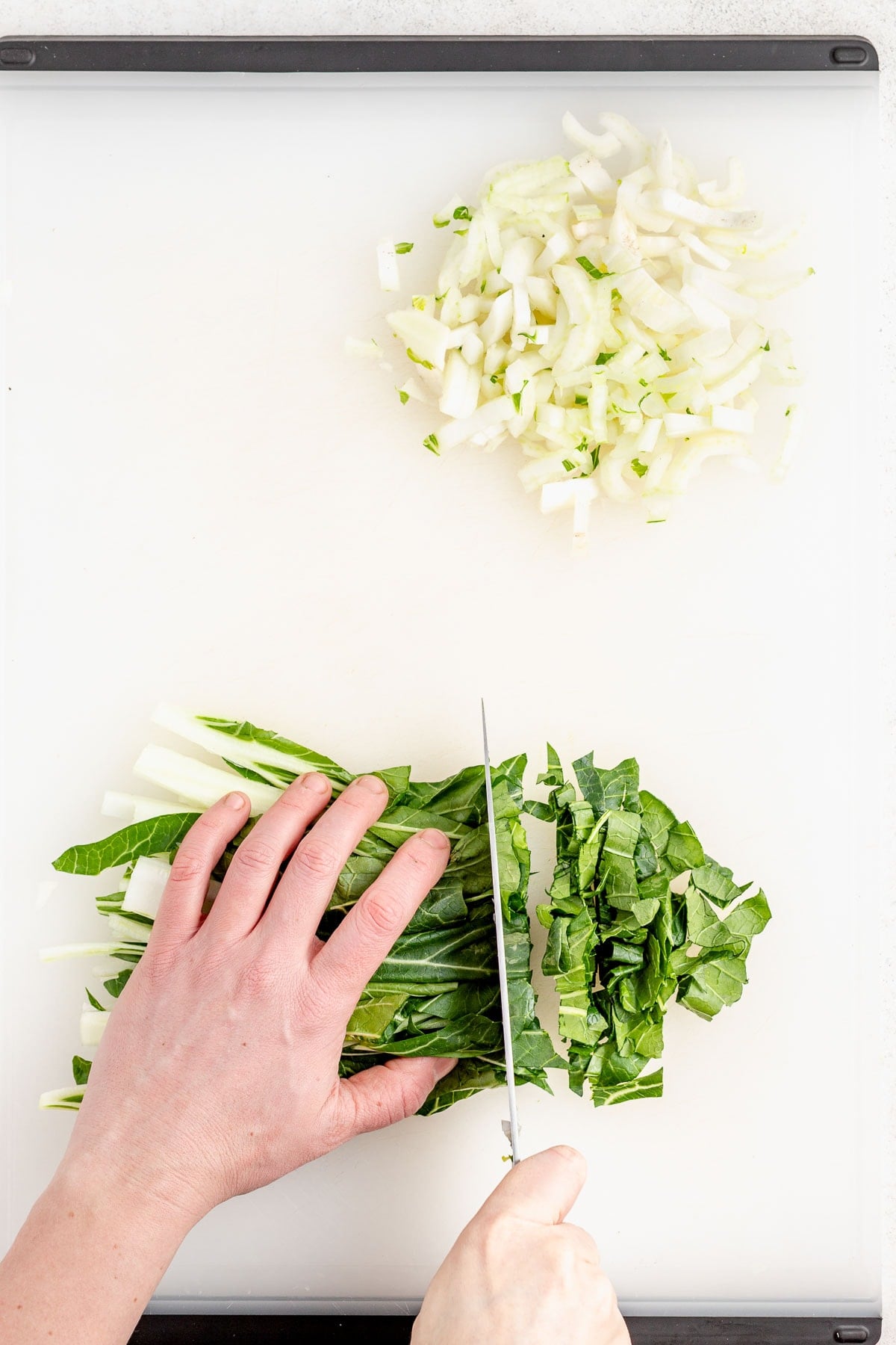 cutting the bok choy leaves