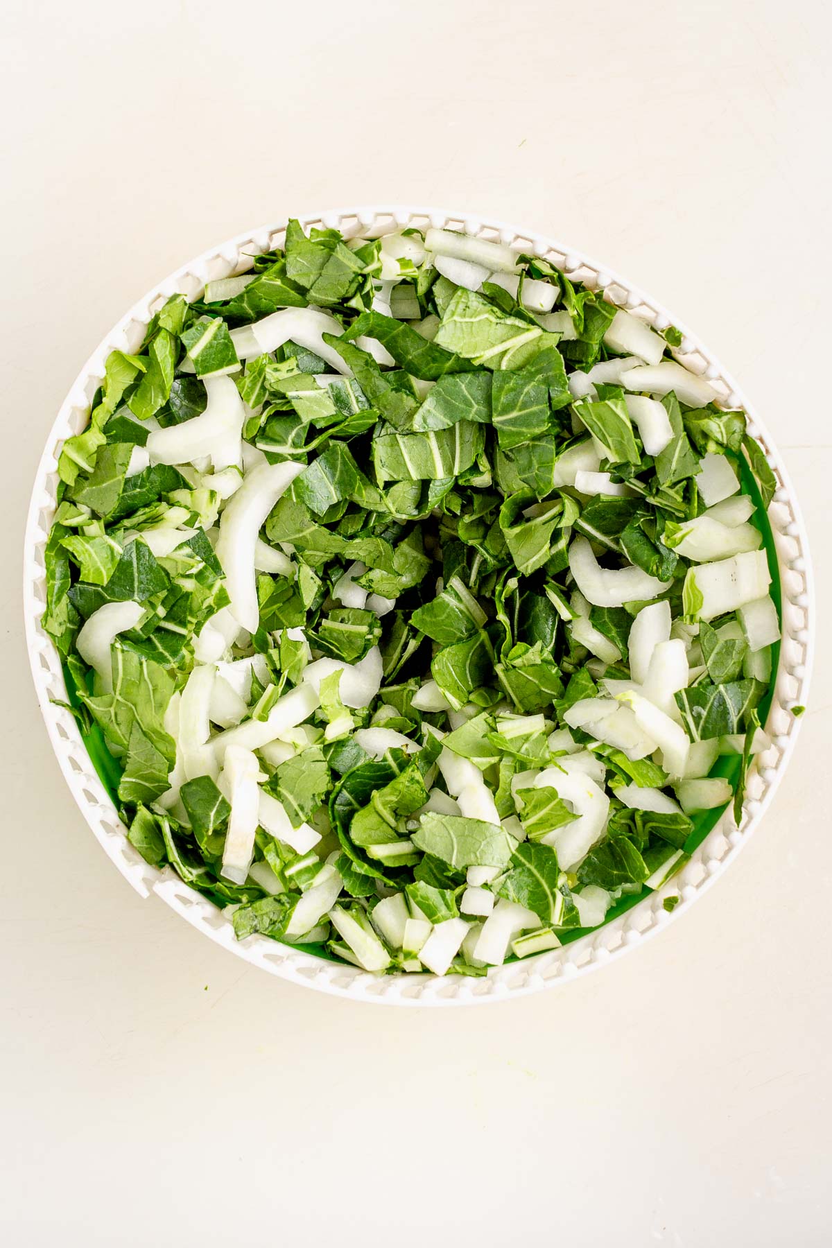 the bok choy after it is spun dry in the salad spinner