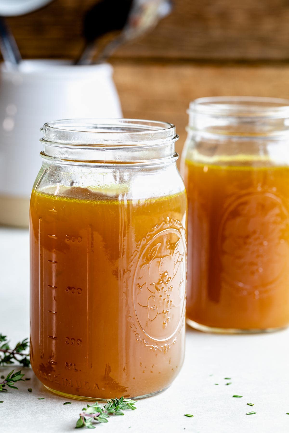 homemade veggie stock decanted into mason jars