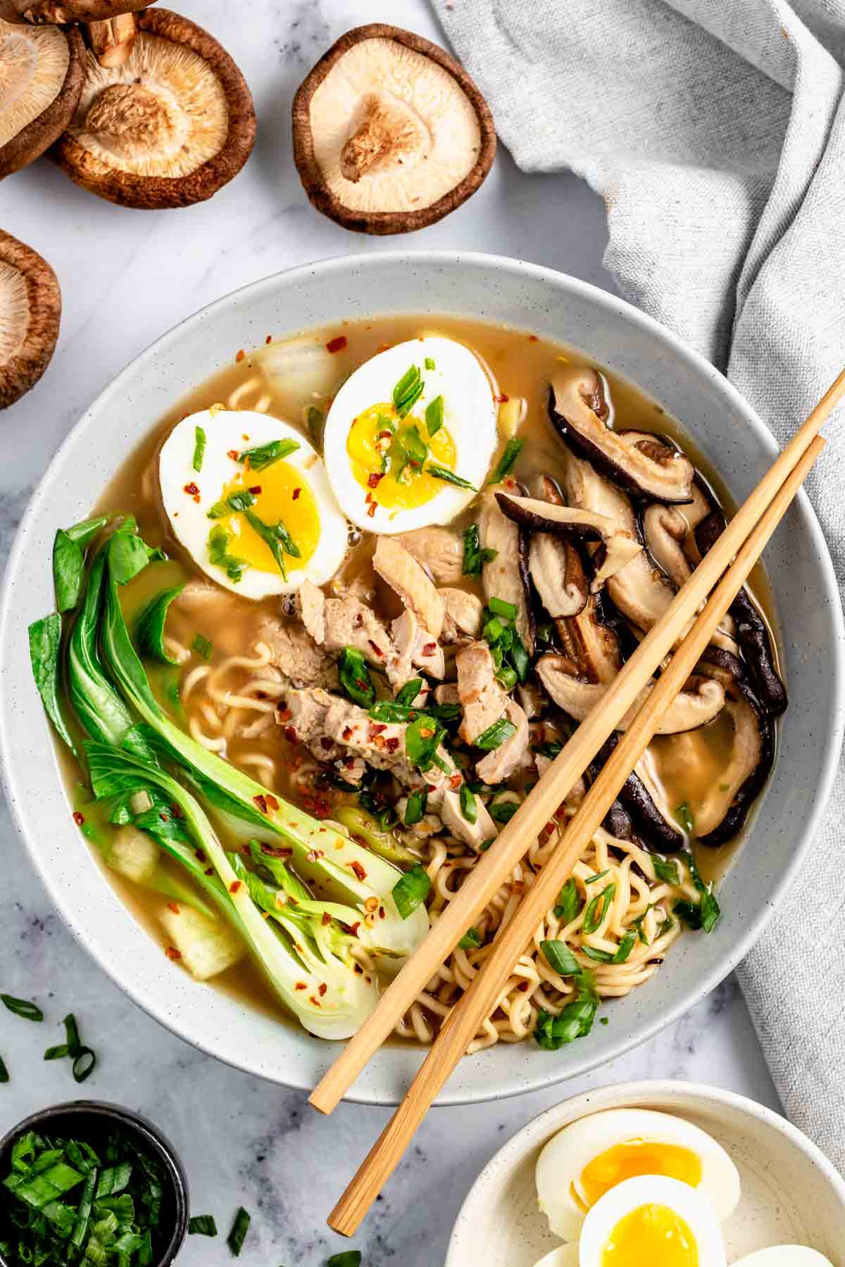 homemade ramen with bok choy, mushrooms, soy sauce and boiled eggs