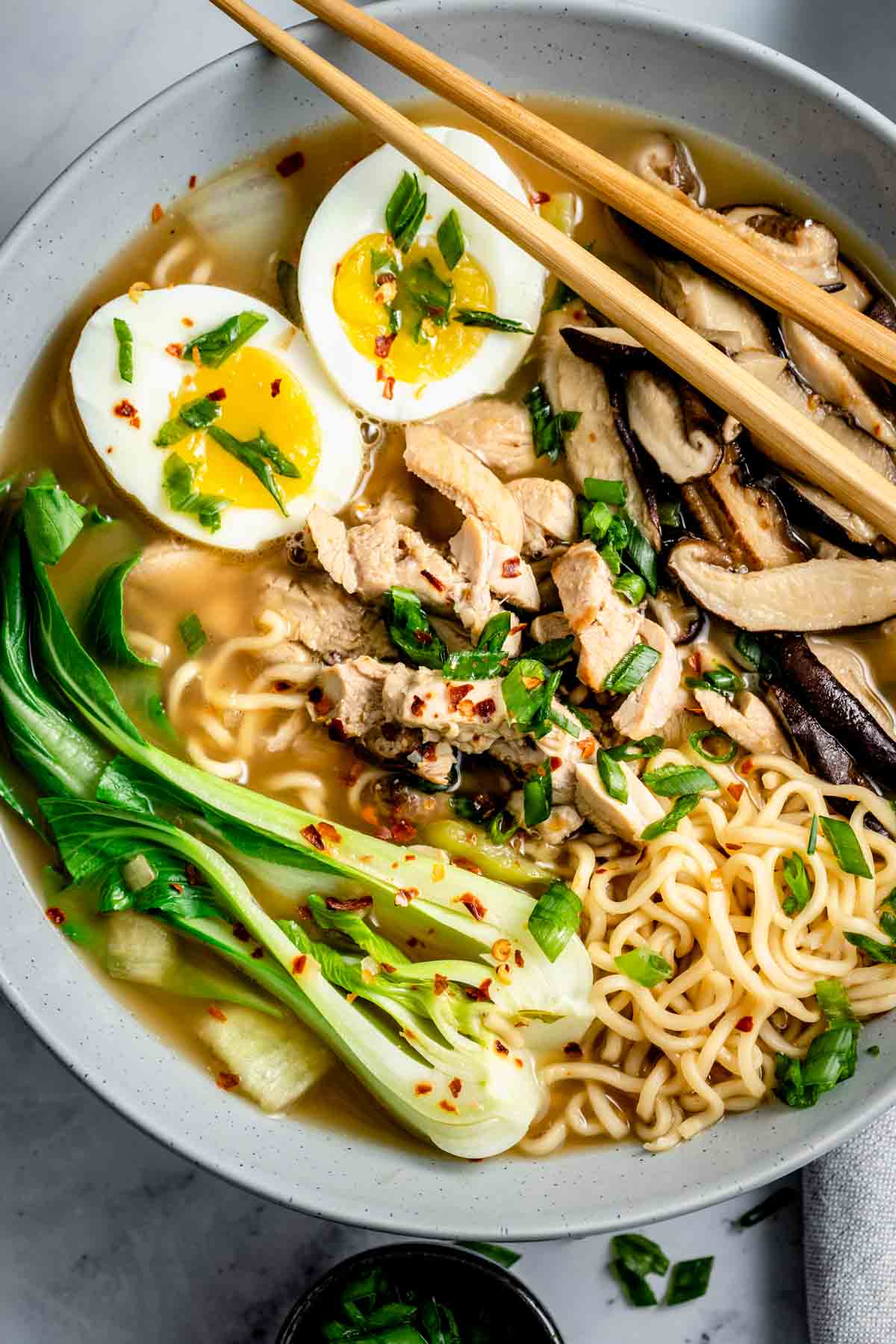 close up image of bok choy ramen noodle soup