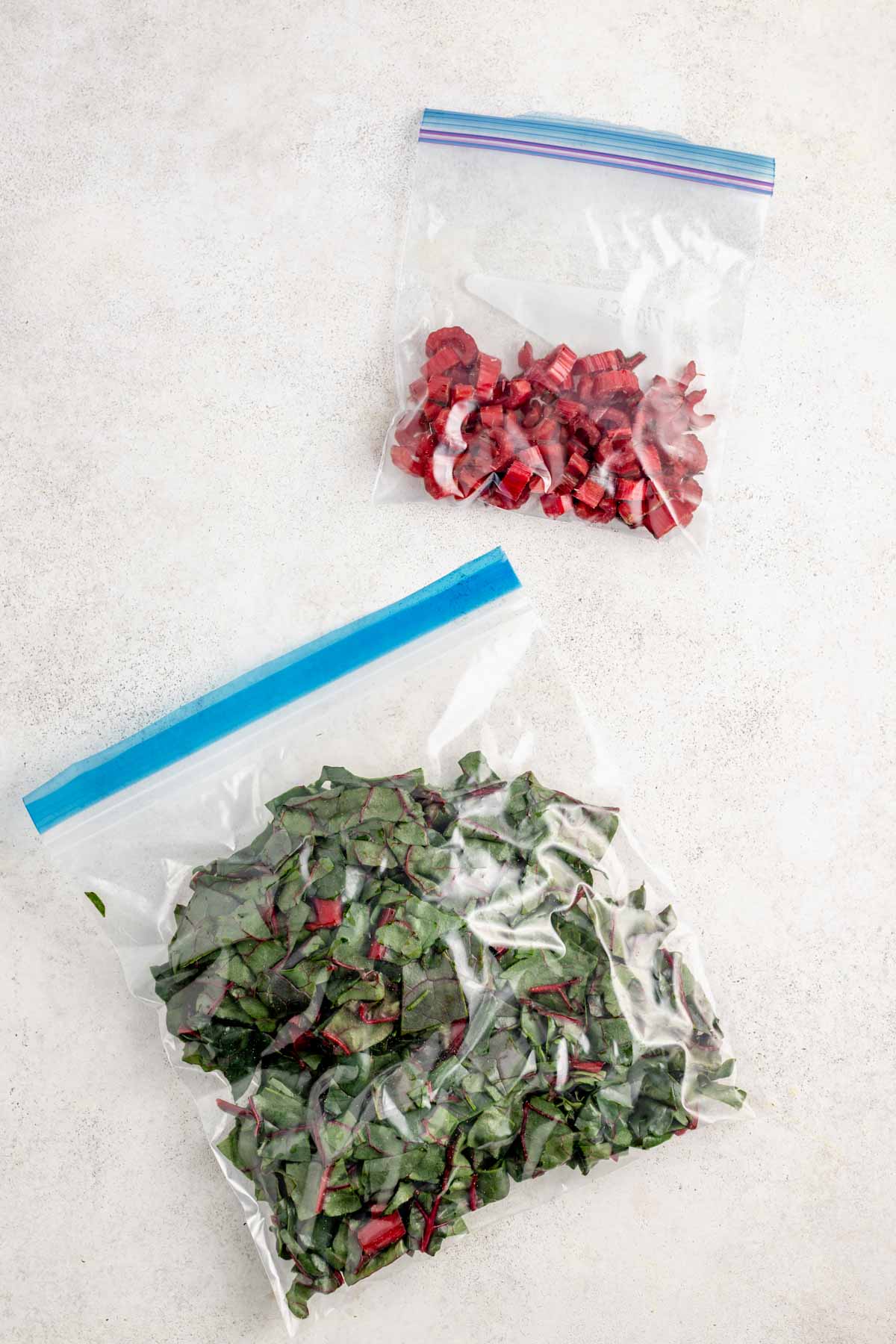 the chard leaves in one bag and the stems in another