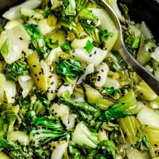 sauteed bok choy garnished with sesame seeds