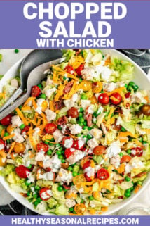 chopped salad with chicken in a large bowl with text overlay