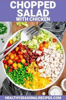 chopped salad with chicken organized by ingredient in a large bowl